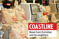 Plastic bags are shown recently at the self-checkout at a Ralphs on Montezuma Road in San Diego. (Photo by Ana Ceballos)