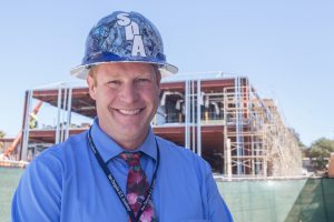 San Dieguito High School Academy Principal Bjorn Paige is pictured Sept. 15 in front of the school's new math and science building. (Photo by Jen Acosta)