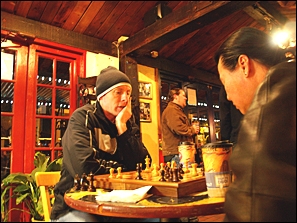 Mark Kenny, left, and Alan Lam are regulars at Old California Coffeehouse in San Marcos. (Photo by David J. Olender)