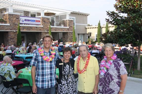 Belmont Village in Cardiff hosted its fourth annual luau Aug. 16 to benefit the American Cancer Society’s Relay For Life of Encinitas. Last year’s event raised more than $2,600. Pictured (l-r): Nathan Clookie from the American Cancer Society, Cathy Ellis, executive director Belmont Village Cardiff, Resident Council President Al Cocumelli and Judy Trendel, Relay for Life chairwoman. (Photo courtesy of Julie Walke)