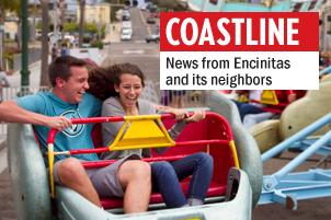 Charlie Fitzsimmons and Ashley Benson take a whirl on the Sizzler, spinning around at the corner of E Street and South Coast Highway 101 at the 30th annual Encinitas Street Fair on April 28. The fair was held on Saturday and Sunday with live music, local arts and crafts and fresh food. (Photo by Scott Allison)