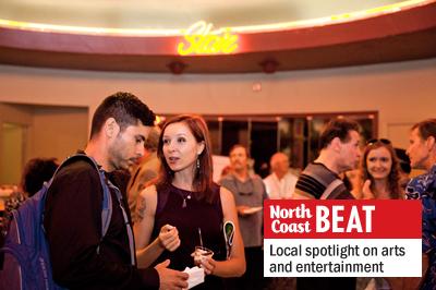 Guests talk in the Star Theatre lobby at the Oceanside Film Festival’s red-carpet opening Aug. 22. (Photo by Paige Nelson)