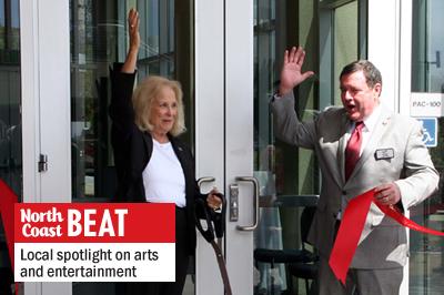 Palomar College Governing Board President Nancy Chadwick (left) and college President Robert Deegan celebrate the opening of the remodeled performing arts complex at the San Marcos campus Sept. 20. (Photo by Manny Lopez)