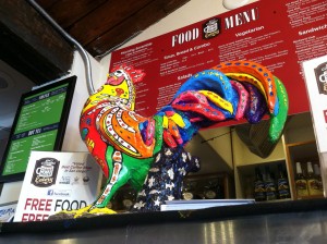 This chicken sculpture, pictured Aug. 15 at Old California Coffeehouse and Eatery in San Marcos, is part of the community’s Chicken Parade event running through Sept. 30. (North Coast Current photo)