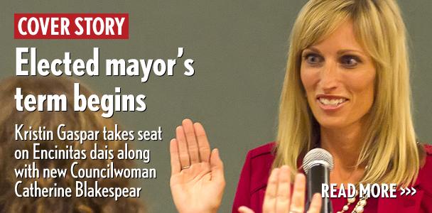 Encinitas Mayor Kristin Gaspar is sworn into office by City Clerk Kathy Hollywood on Dec. 9. (Photo by Scott Allison)