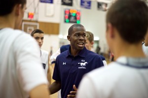 “I hope to establish a program where players exemplify integrity, trustworthiness and depth of character,” says new San Dieguito Academy boys basketball coach Jason Stewart, pictured Dec. 5 during a game in Santee. (Photo by Troy Orem)