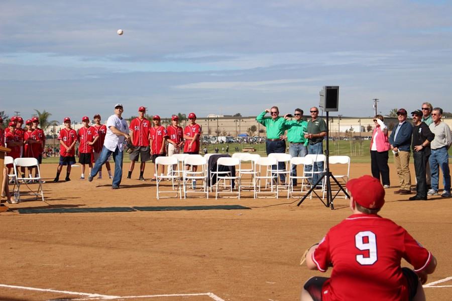 Encinitas resident and retired Major League catcher and designated hitter Matt Nokes throws the ceremonial first pitch Jan. 10 at the new Encinitas Community Park fields. (Photo by Susan Nokes)
