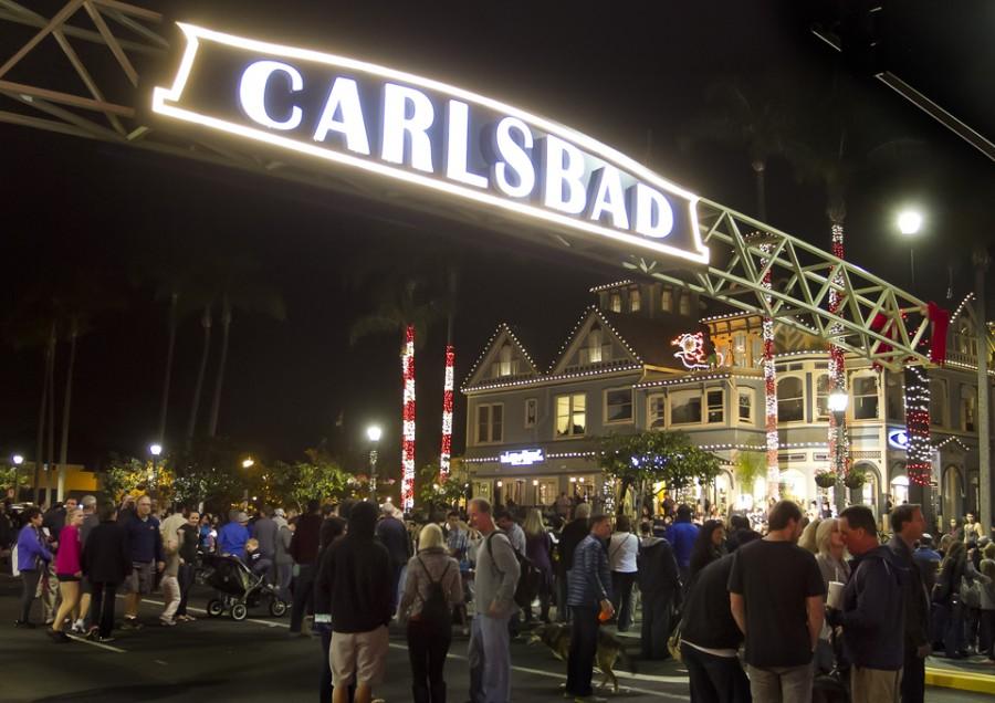 The new Carlsbad sign, dedicated Jan. 8, stretches over Carlsbad Boulevard at the intersection of Carlsbad Village Drive next to the historic former Twin Inns building. (Photo by Scott Allison)