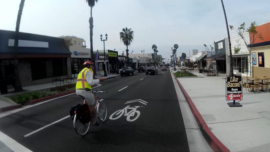Howard+LaGrange%2C+City+of+Oceanside+Bike+and+Ped+Coordinator+rides+by+a+Sharrow+on+Mission+Ave