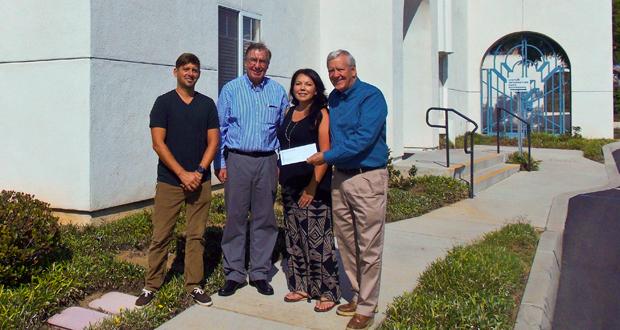 Left to right: David Verdugo, Rincon Tribal Member and Secretary of the Rincon Contributions Committee, awards contribution to Oceanside Harbor Days, and Oceanside City Councilman Jerry Kern, Tismall Turner, Chair Rincon Contributions Committee, and Oceanside Chamber President and CEO David Nydegger. (courtesy photo)