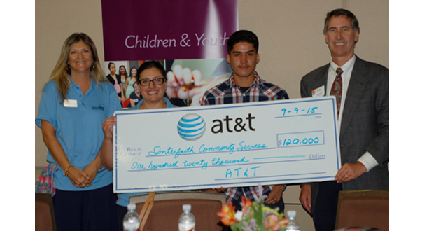 left to right: Rae Martin, Transitional Youth Academy staff member; Amber Rizkalla, Transitional Youth Academy Program Director; Ezra Gonzalez, Transitional Youth Academy student; and John Osborne, AT&T Director of External Affairs
 (courtesy photo)