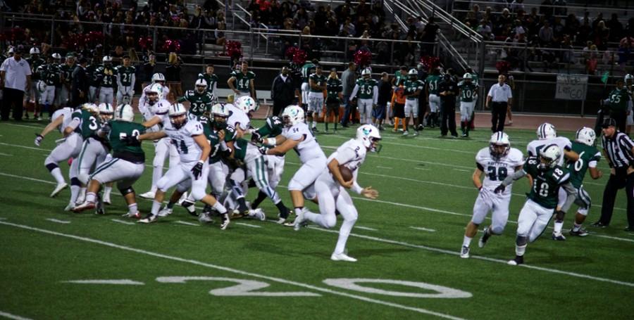 La Costa Canyon High School junior Tanner Clark runs the ball during the Oct. 30 game against Oceanside High School at Oceanside’s Simcox Field. Oceanside won the game 22-7. (Photo by Troy Orem)