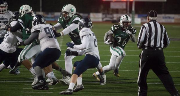 Niko Magio slips around the left side on a misdirection play to go untouched into the endzone