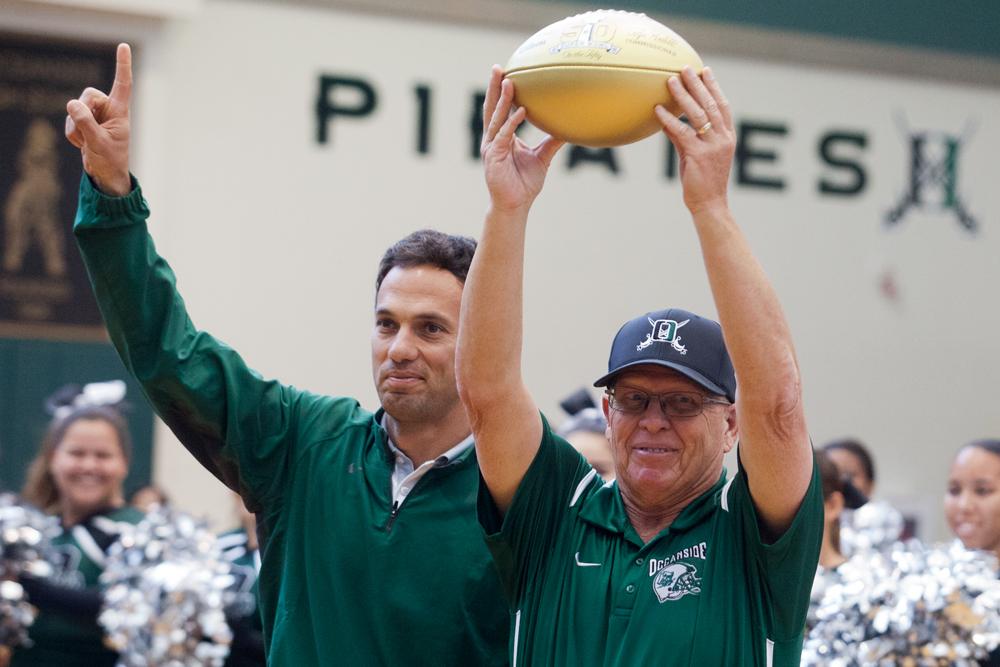 OHS Receives Two Gold NFL Footballs