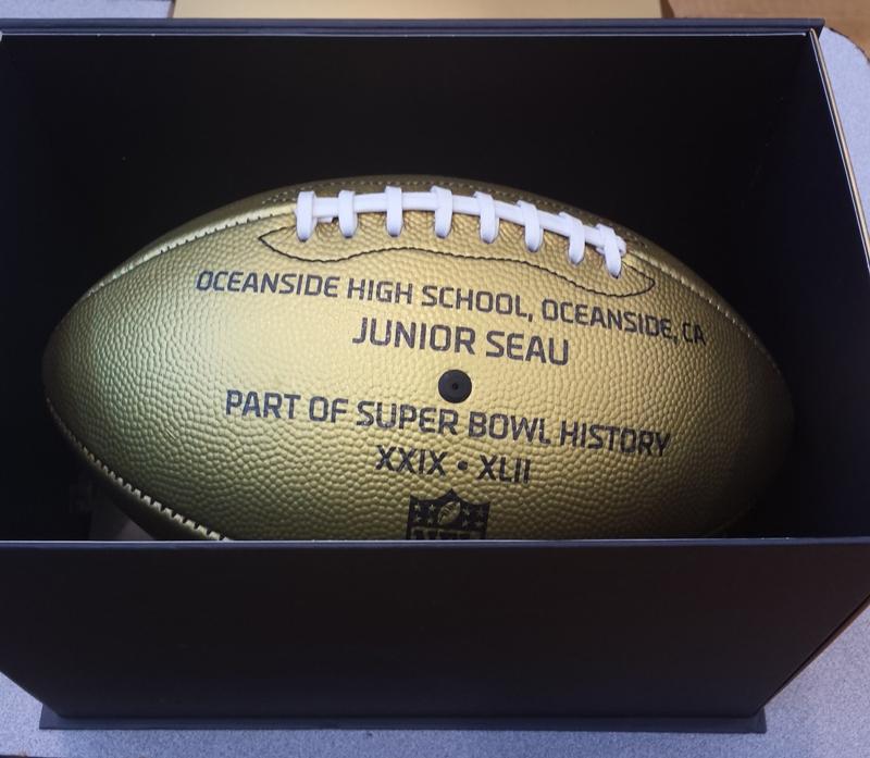 OHS Receives Two Gold NFL Footballs
