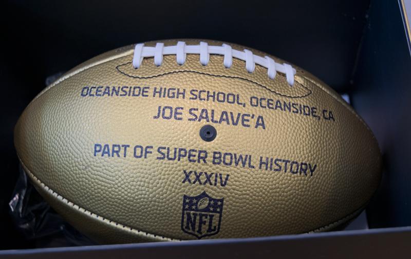 OHS Receives Two Gold NFL Footballs