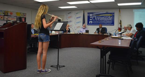 Danika Benson performs for OUSD Board Members