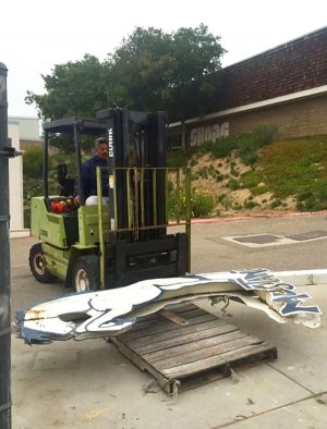 San Dieguito Academy Plant Supervisor Gabe Figueroa prepares the Metal Mustang for transport to Baker Ironworks on March 3. (SDA Foundation photo)