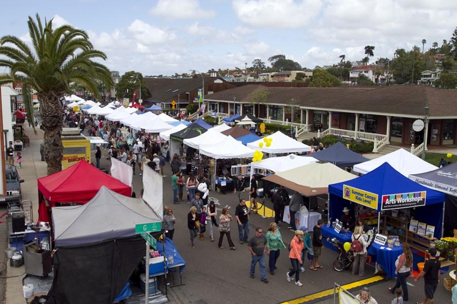 Visitors peruse vendors at the Encinitas Spring Street Fair, viewed from atop the Rock2You rock climbing wall at the corner of G Street and South Coast Highway 101 on April 26, 2014. (NCC file photo by Scott Allison)