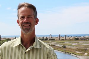 Doug Gibson, executive director of the San Elijo Lagoon Conservancy, pictured in early October, discusses work with agencies such as Caltrans to provide improvements to the lagoon reserve. (Photo by Meghan Lanigan)