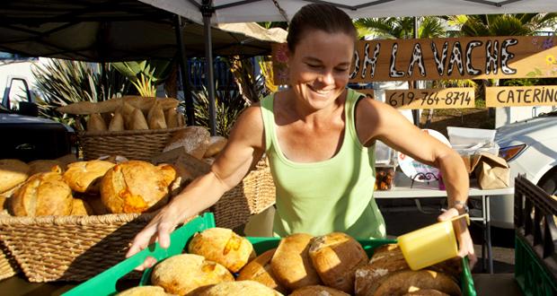 Heather Allen ,with Oh La Vache Bakery, sets out a variety of fresh baked breads.
(file photo)