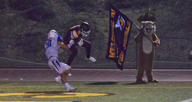Defended by Matt Araiza(10), Brandon Johnson(15) collects the winning touchdown pass