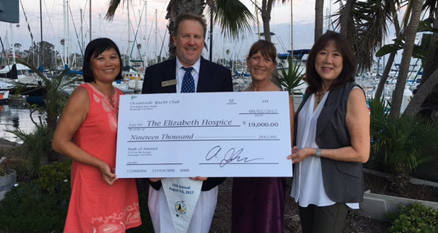 L to R: Vatei Campbell, Elizabeth Hospice Grants Officer, Adam Johnson, OYC Commodore, Terri Manok, OYC Charity Regatta Chair, Jean Loo-Russo, Elizabeth Hospice Chief Philanthropy Officer (courtesy photo)