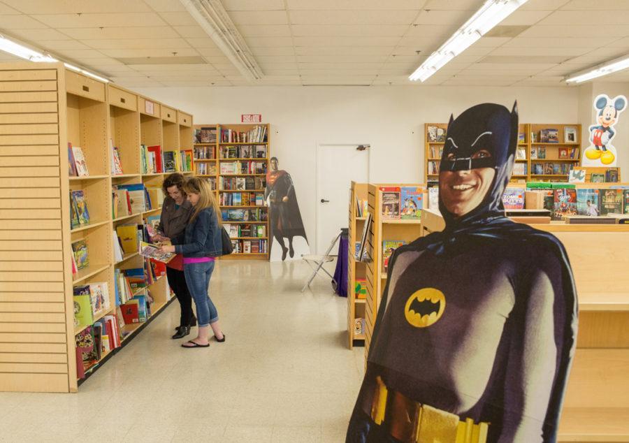 Sylvia Williams, left, and Anne Marie Lopez browse books in the Children’s Section of Crown Books in Encinitas on Sept. 21. (Photo by Cam Buker)