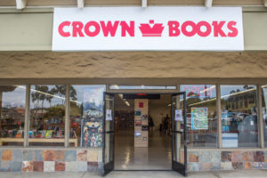 Even though Crown Books' Encinitas location, pictured Sept. 21, has only been open for a few months, it is doing more buy-sell-trade than its other two locations in San Diego County, store manager Kelvin Thurston says. (Photo by Cam Buker)