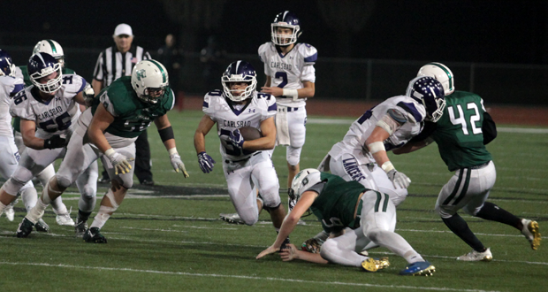 Lancers offensive line opens a hole for Tony Torres's second touchdown of the night.