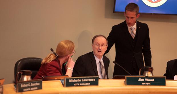 Oceanside City Manager Michelle Skaggs Lawrence, Mayor Jim Wood and Oceanside City Clerk, Zack Beck at the December 6, 2017, City Council meeting