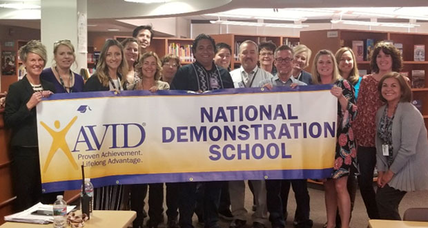Chavez Middle School staff show off their well earned banner.  (Photo courtesy: OUSD)