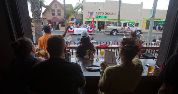 Watching the parade from the comfort of the Local Tap House and Kitchen. One of several places to watch the parade and enjoy breakfast along the parade route.