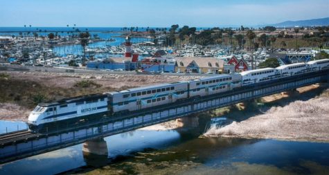 A Metrolink train moves along tracks over Oceanside Harbor. (OsideNews photo)