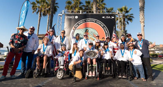 Team USA hoists their first-ever Team World Champion Trophy. (Photo: ISA / Sean Evans)