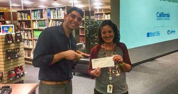 El Camino High School (Oceanside) Teacher Elizabeth Perkoski (right) receives a $500 North Island Credit Union Teacher Grant from Joshua Rehhaut, School & Community Development Officer, North Island Credit Union. (Photo courtesy: NICU)