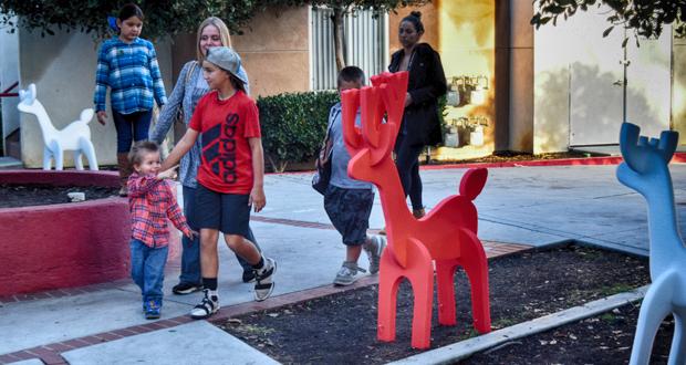 Volunteers Gather to Surprise Families with Holiday Cheer at Solutions for Change