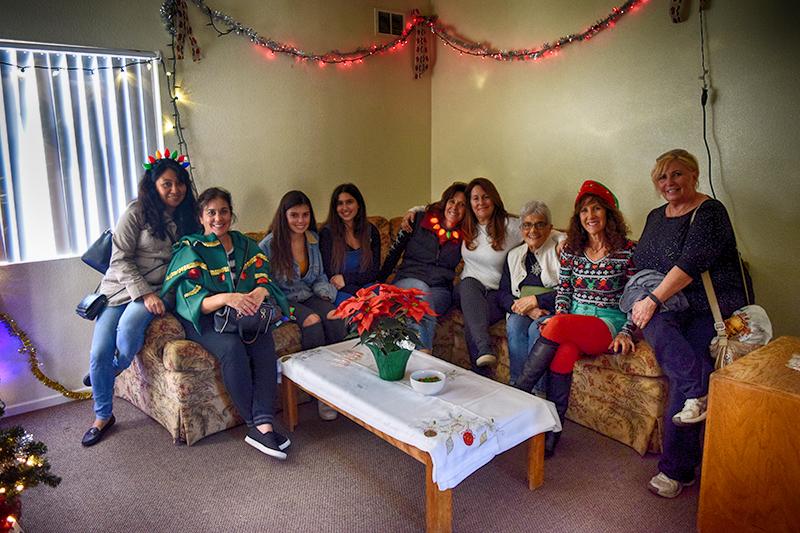 Volunteers Gather to Surprise Families with Holiday Cheer at Solutions for Change