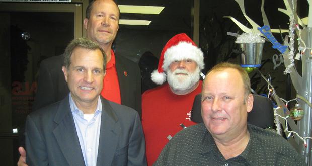 ( left to right) Steve Becvar, ALS; Paul Negulescu, Vertex; Keith Miller (wearing Santa hat), ALS; Peter Grootenhuis, Vertex. (courtesy photo)