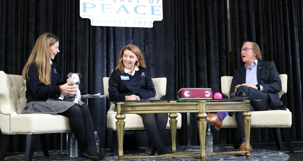 Student Moderators, Katie-Marie Zickert '20 (junior) and
 Maggie Brady '19 (senior) with Sony President and COO, Mike Fasulo. (Photo courtesy: OLP)