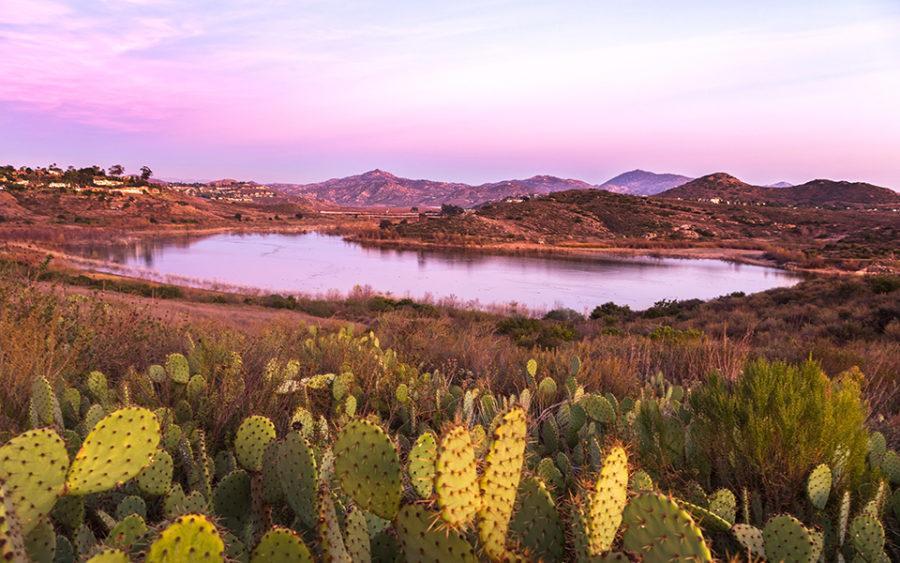 Lake+Hodges+is+shown+at+sunset+in+February+2018+looking+east+toward+the+pedestrian+bridge%2C+visible+in+the+far+distance.+%28Photo+by+Autumn+Sky+Photography%3B+iStock+Getty+Images%29