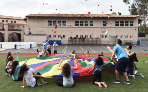 Students play a game during physical education at The Rhoades School’s main campus in Encinitas. (Rhoades School photo)