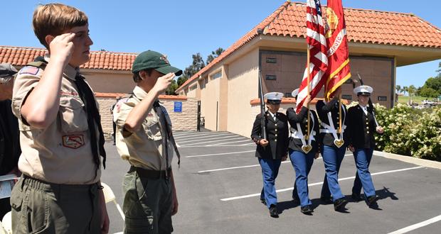 Scouts from Troop 752 salute the Presentation of the Colors by by the El Camino High School MCJROTC