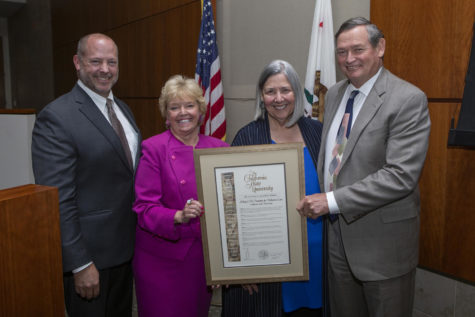 San Diego philanthropist Darlene Marcos Shiley (second from right) stands with Cal State San Marcos President Karen Haynes (second from left), California State University Chancellor Timothy White (right) and CSU Board of Trustees Chairman Adam Day after the May 21 Board of Trustees meeting where the Shiley CSU Institute for Palliative Care renaming was approved. (CSU photo by Patrick Record)