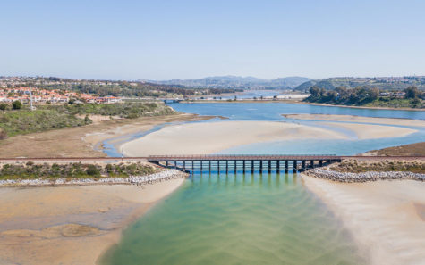 An aerial view shows an eastward view of Batiquitos Lagoon. Carlsbad is to the north. Encinitas is to the south. (Photo by Diane Bentley Raymond, iStock Getty Images)