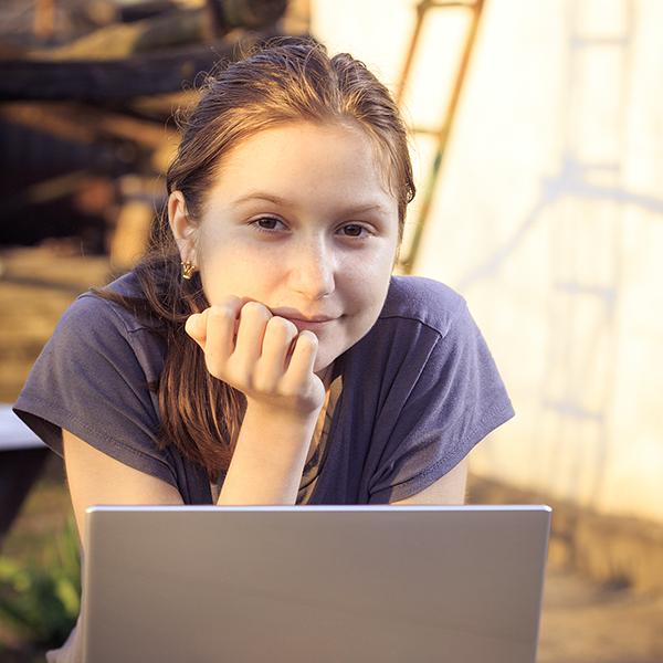 Student at computer. (Sergii Mostovyi/Adobe via StatePoint)