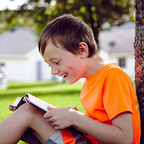 Child reading. (Olesya Shelomova/Adobe via StatePoint)