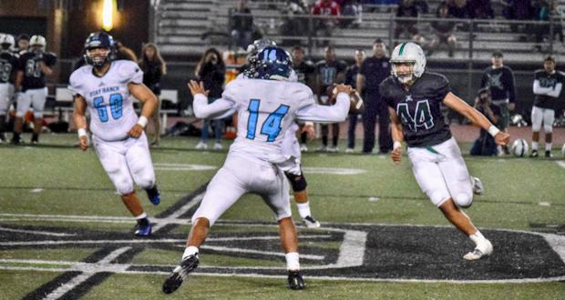 Christopher “Kiki” Laie(44) has his sights set on Otay Ranch QB Jonte “Puka” Stewart in Oceanside’s 27-15 win over the Mustangs in the first round  2018 CIF San Diego Section, Division playoffs 