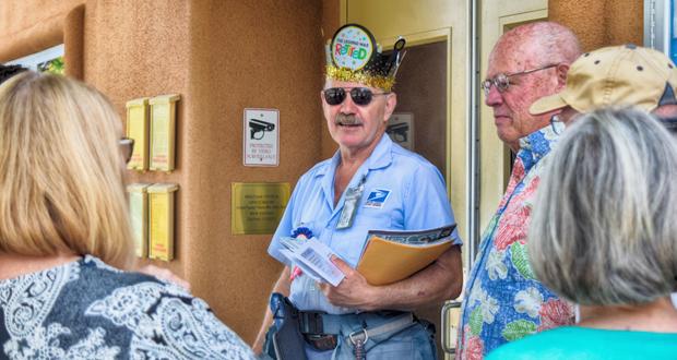 Retiring Letter Carrier, Gerard Comeaus with a group of Oceana residents bidding him a fond farewell.