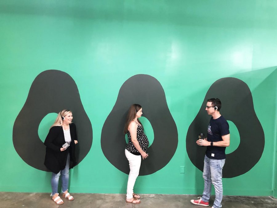 Joanna Rossoni, Briana Fillmore and Sam Bouffard participate in activities at The CADO museum in San Marcos on July 6. The pop-up museum is dedicated to the avocado. (CADO Museum photo)